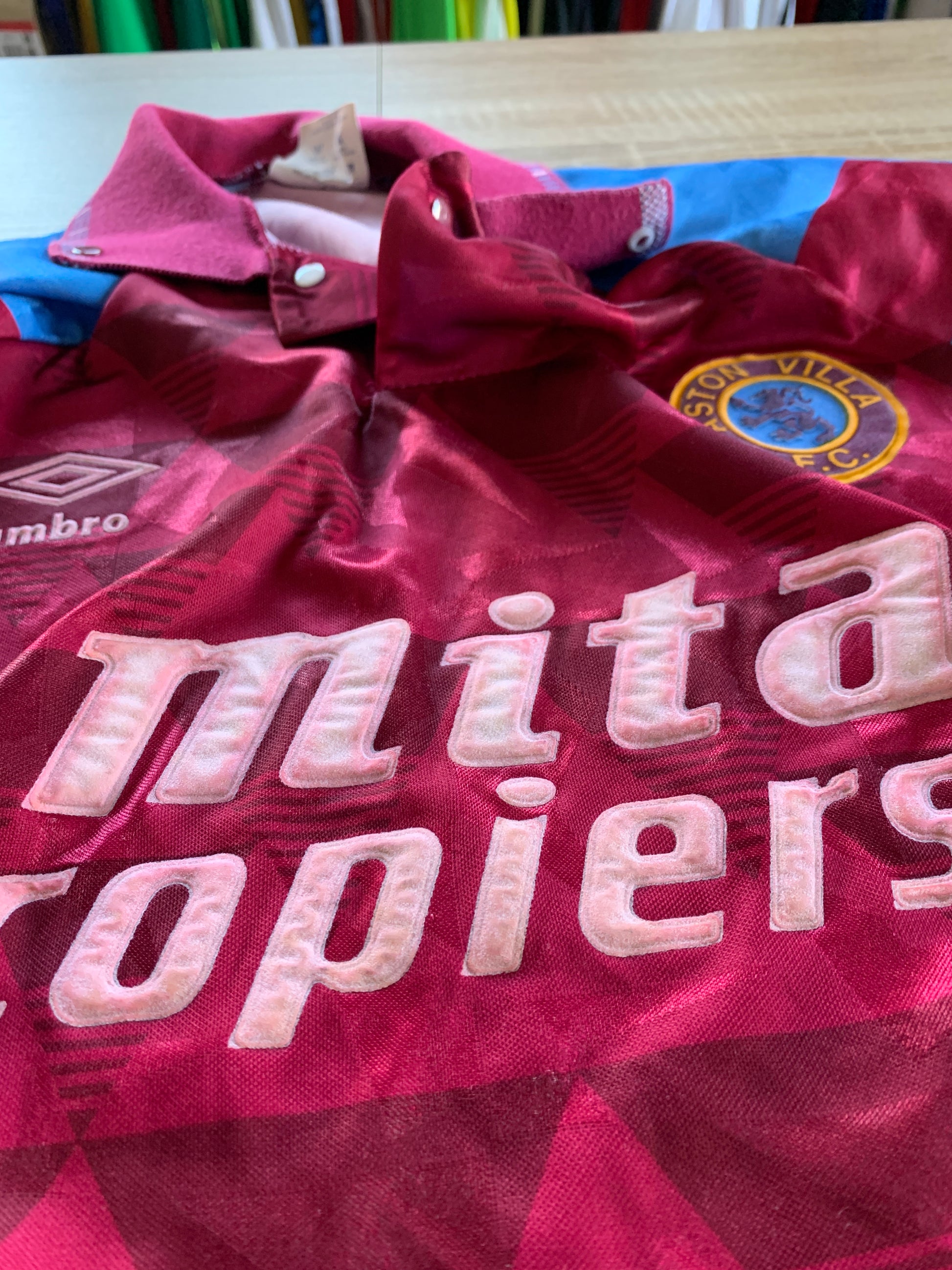 Aston Villa Home Shirt from 1990-1992: The classic home jersey worn by Aston Villa during the 1990-1992 period. Featuring the club's emblem and a traditional design, this shirt captures the essence of the team's representation and efforts on the field during that specific era.